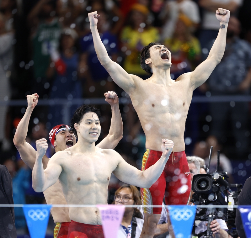 Swimmer fulfills Olympic redemption in historic relay victory3.jpg
